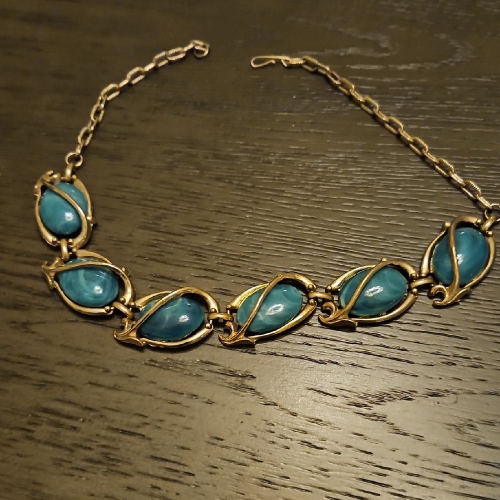 Elegant Gold and Blue Necklace